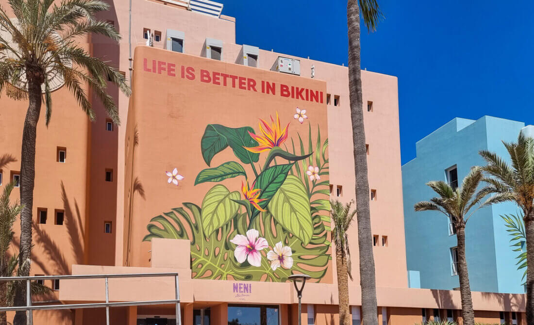 Large-format facade mural by Selfmadecrew